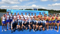 The British Rowing U23 M8+ collecting silver medals at the 2018 World Rowing U23 Championships 2018.jpg