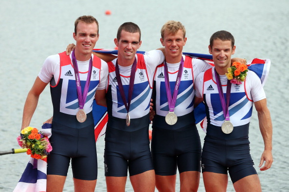 Chris Bartley, Richard Chambers, Rob Williams and Peter Chambers of Great Britain celebrate with their silver medals in the Lightweight Men's Four final on Day 6 of the London 2012 Olympic Games at Eton Dorney on August 2, 2012